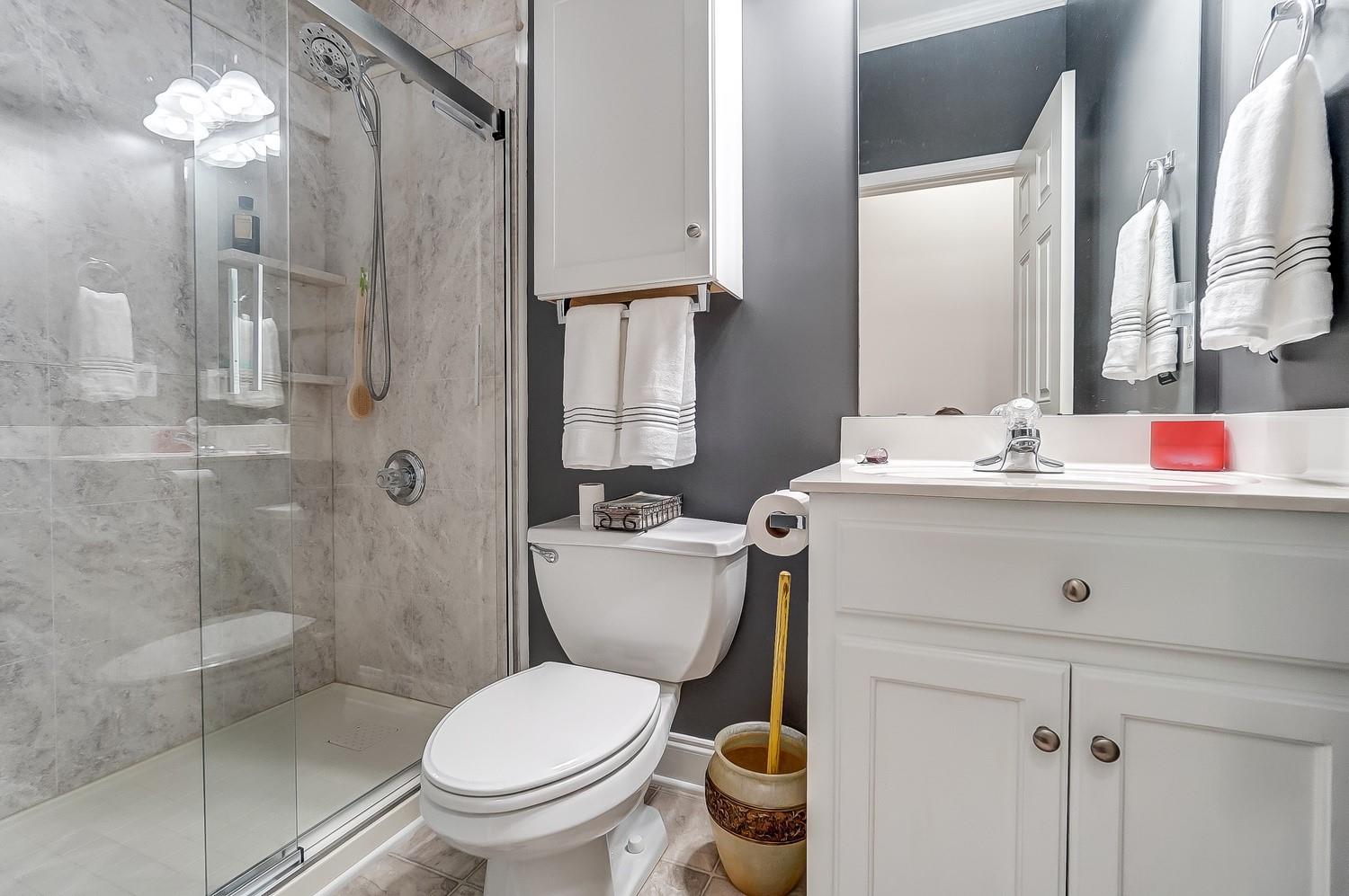 306 Wendover Drive Locust, NC 28097 - Photo 31 of 42 a bathroom with a sink toilet and shower