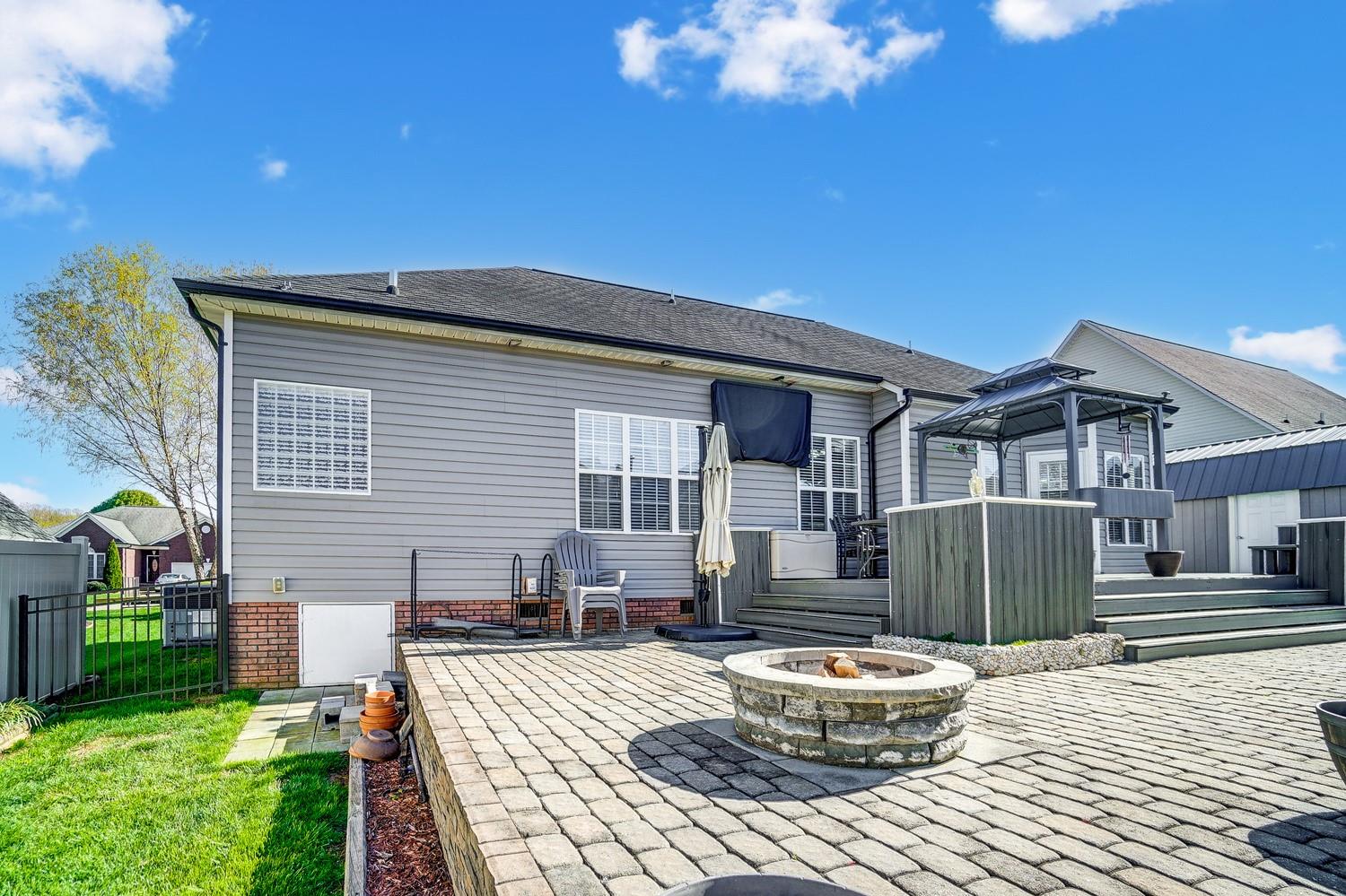 306 Wendover Drive Locust, NC 28097 - Photo 38 of 42 a backyard of a house with yard and outdoor seating