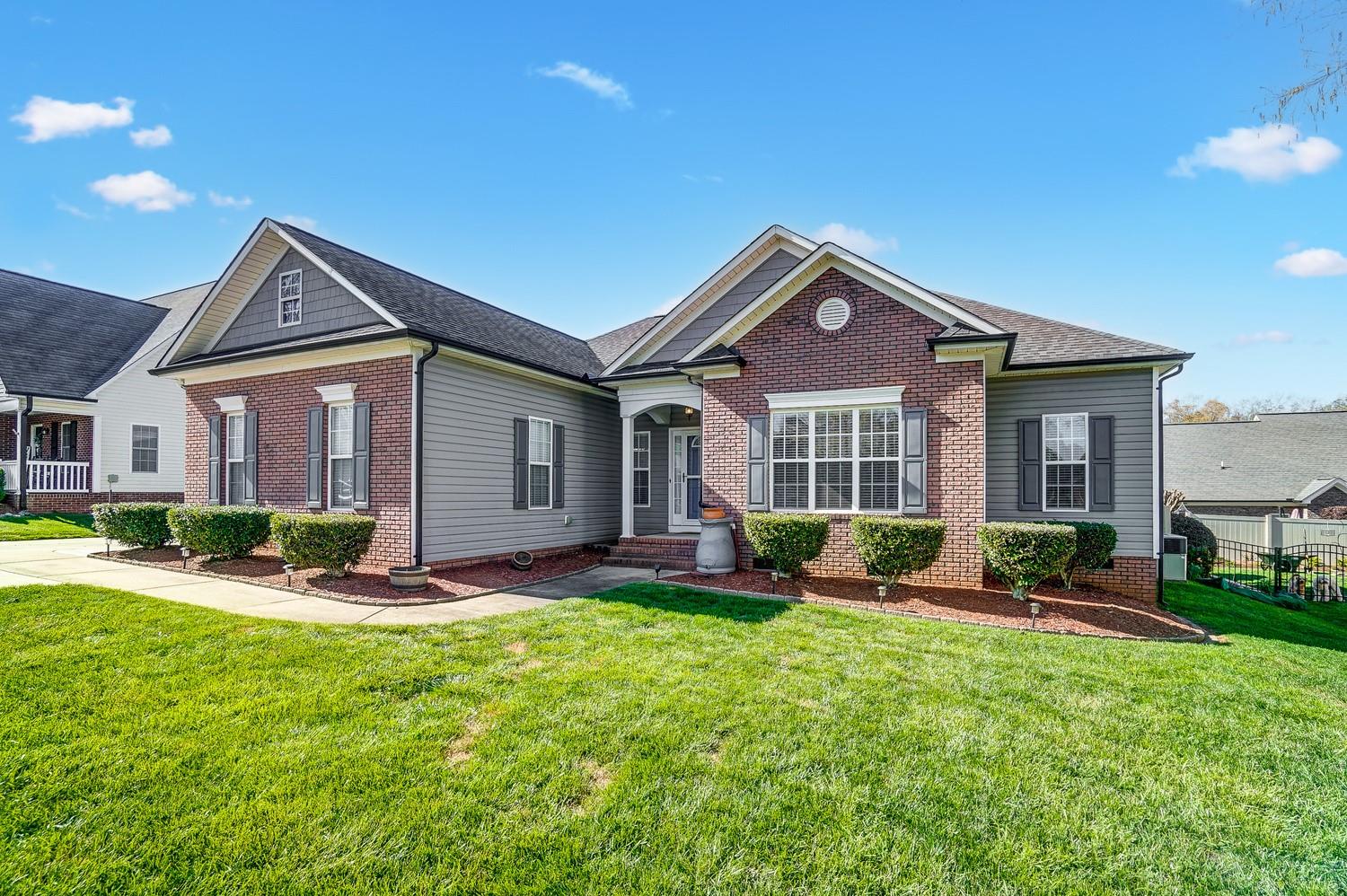 306 Wendover Drive Locust, NC 28097 - Photo 4 of 42 a front view of a house with a yard