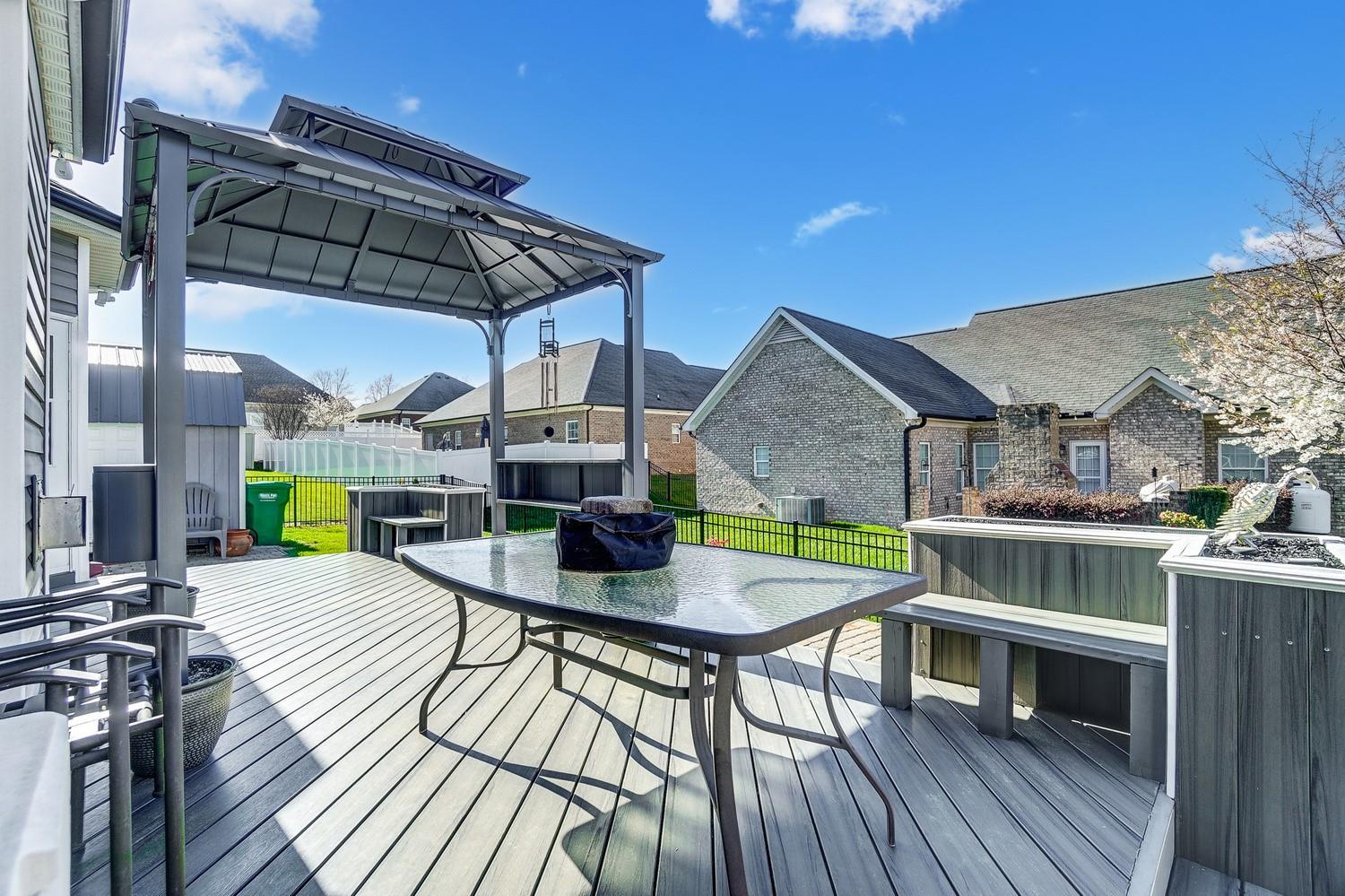 306 Wendover Drive Locust, NC 28097 - Photo 42 of 42 a view of a patio with a table and chairs