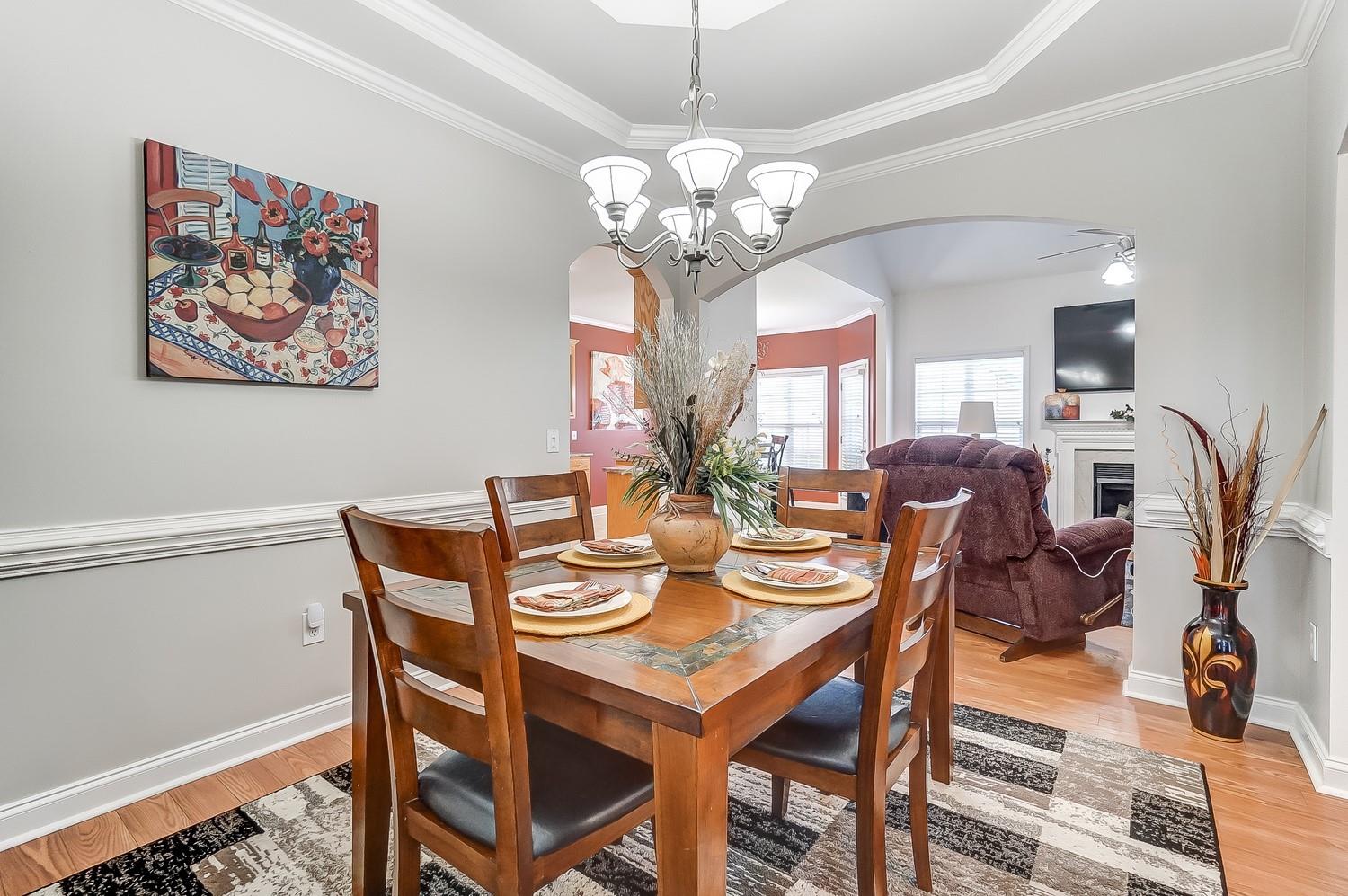306 Wendover Drive Locust, NC 28097 - Photo 8 of 42 a view of a dining room with furniture and chandelier