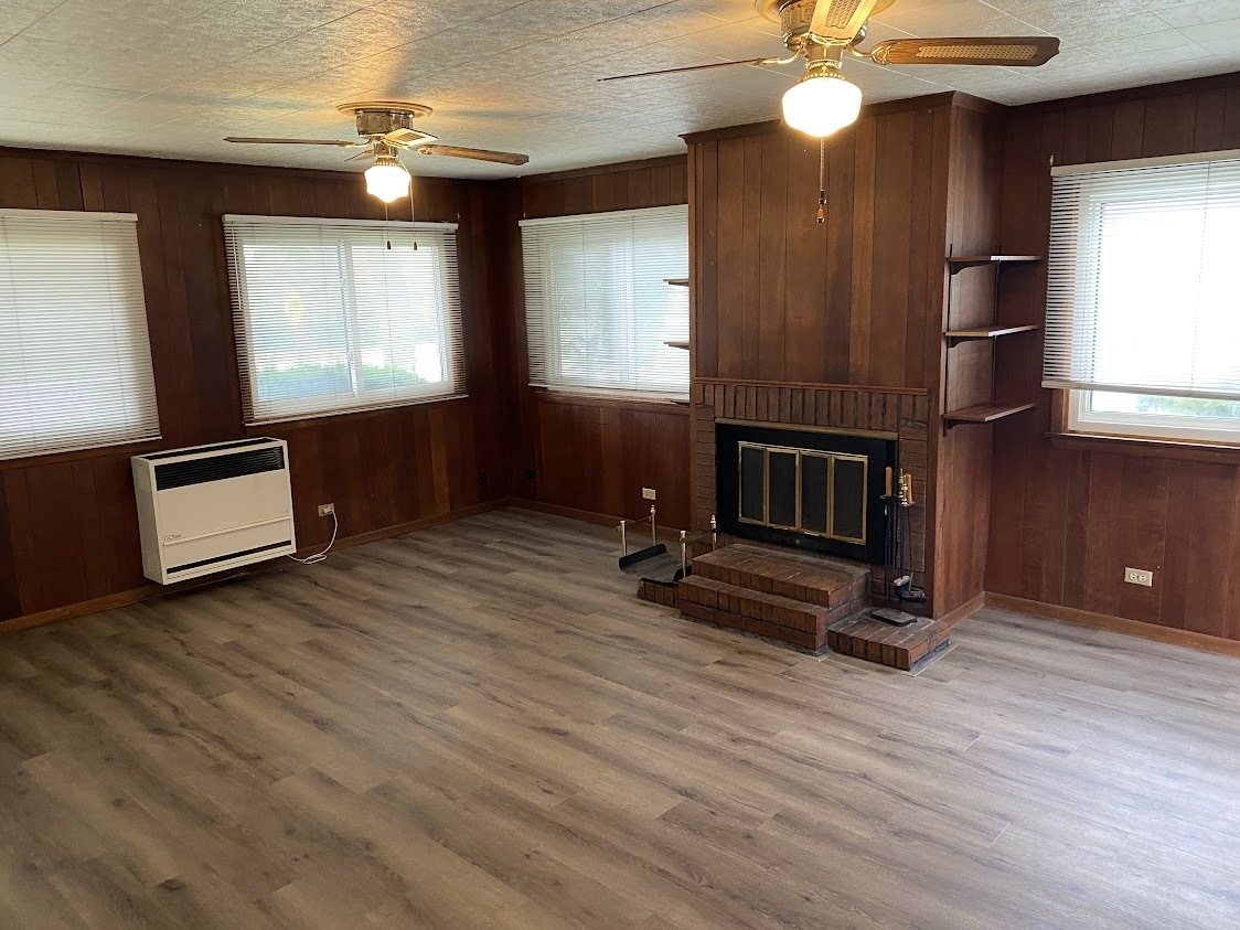 459 West Butterfield Road Elmhurst, IL 60126 - Photo 11 of 17 a view of livingroom with hardwood floor and a ceiling fan