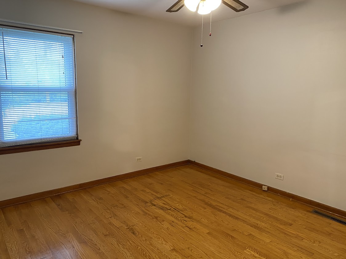 459 West Butterfield Road Elmhurst, IL 60126 - Photo 8 of 17 a view of an empty room with a window