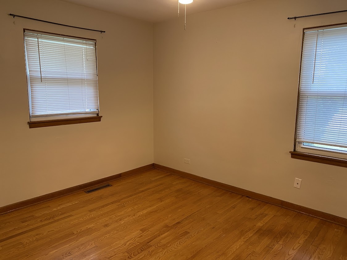 459 West Butterfield Road Elmhurst, IL 60126 - Photo 9 of 17 an empty room with a window