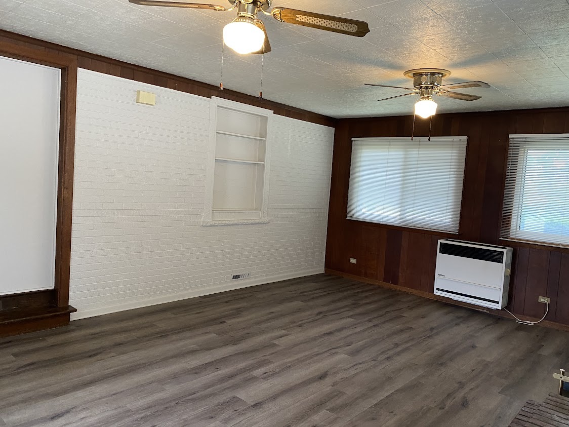 459 West Butterfield Road Elmhurst, IL 60126 - Photo 10 of 17 a view of room with window and wooden floor