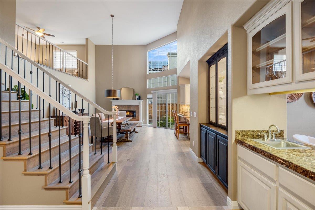 17446 Serene Drive Morgan Hill, CA 95037 - Photo 18 of 82 a kitchen with stainless steel appliances granite countertop lots of counter top space and wooden floor