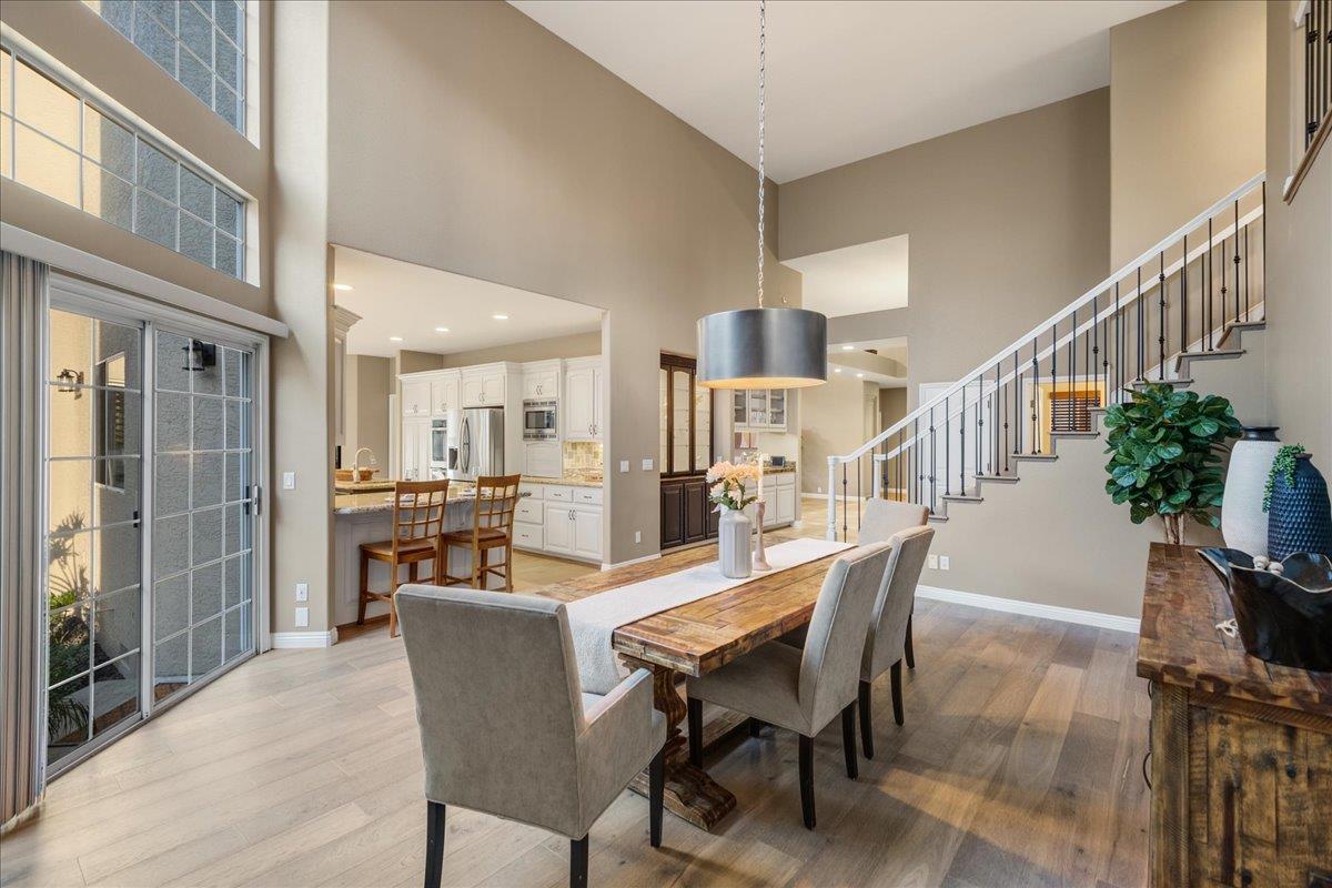 17446 Serene Drive Morgan Hill, CA 95037 - Photo 21 of 82 a dining room with furniture and wooden floor