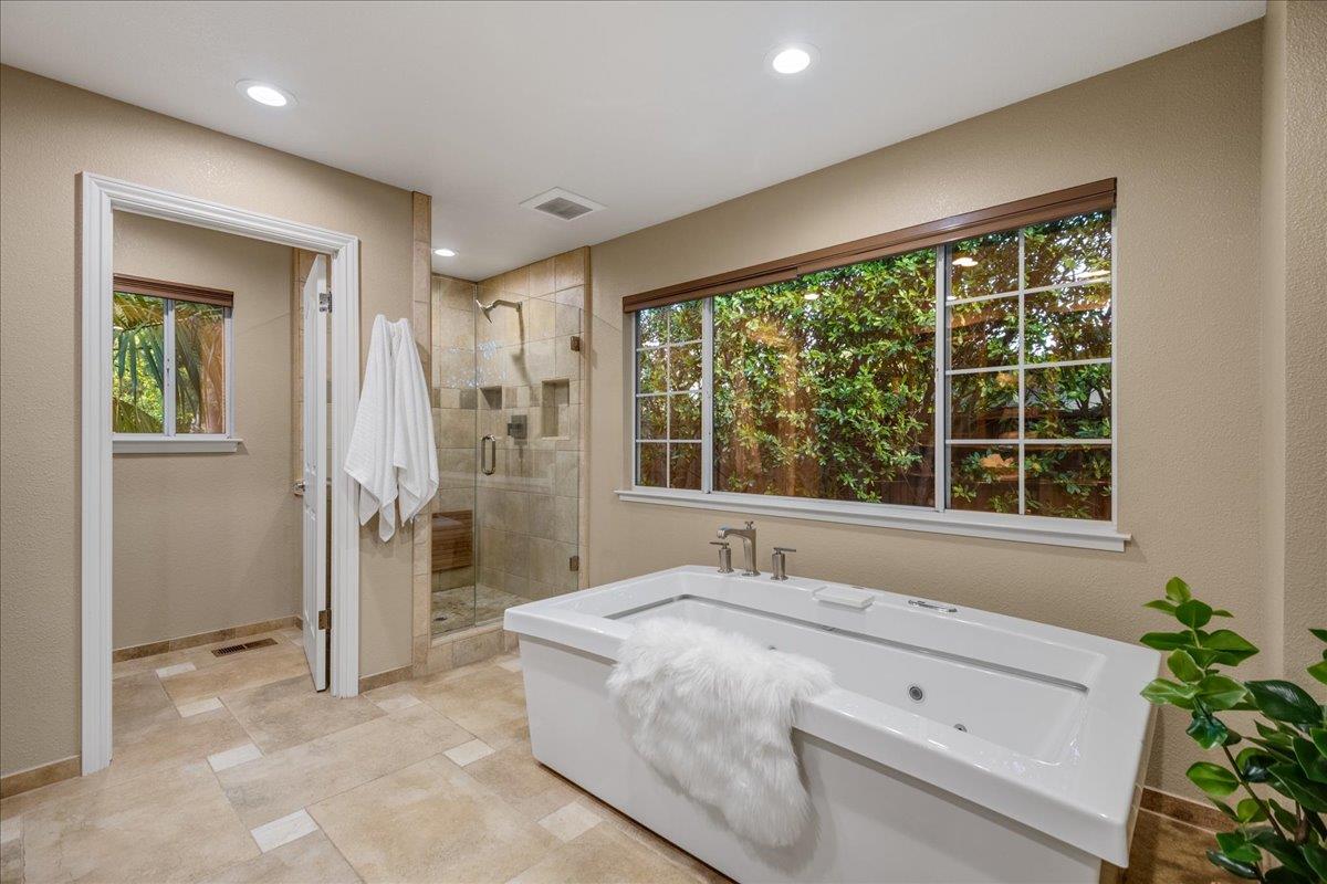 17446 Serene Drive Morgan Hill, CA 95037 - Photo 36 of 82 a bathroom with a sink and a large mirror