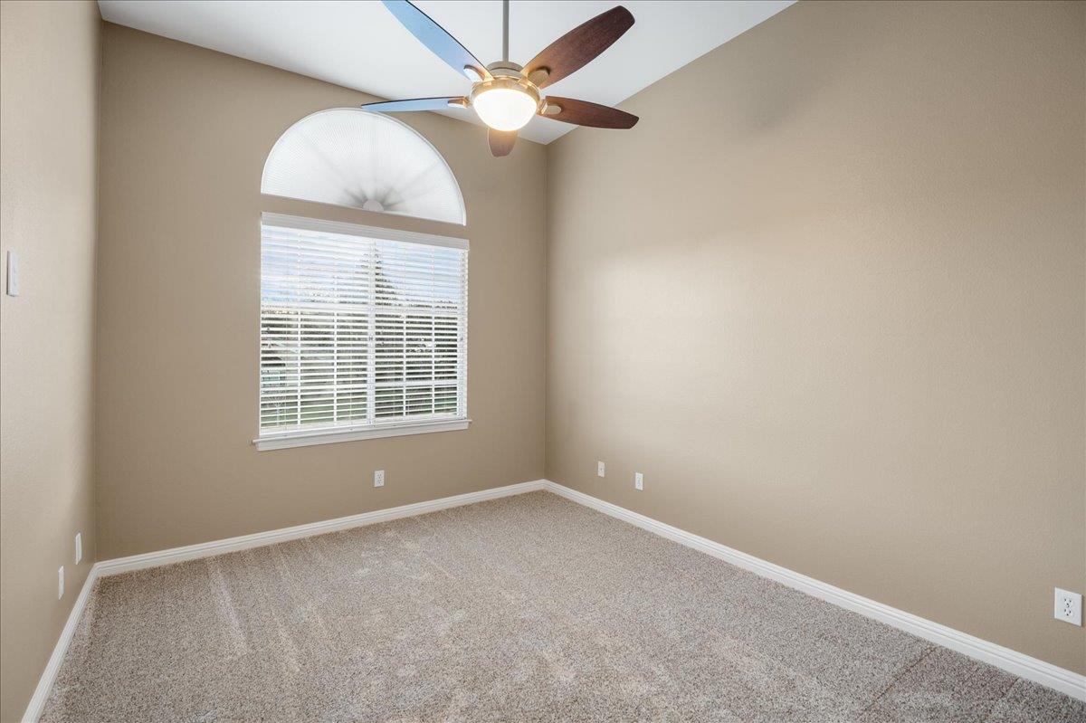 17446 Serene Drive Morgan Hill, CA 95037 - Photo 40 of 82 an empty room with a window and a fan