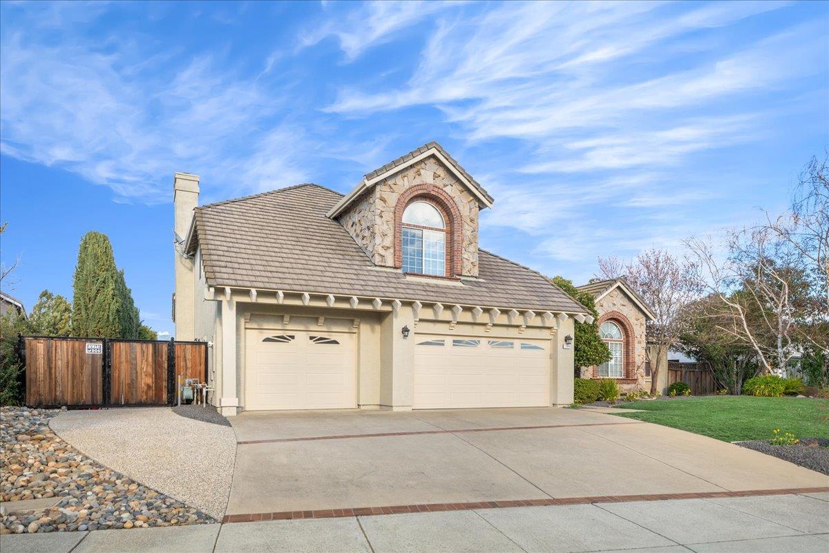 17446 Serene Drive Morgan Hill, CA 95037 - Photo 5 of 82 a view of a house with a yard and garage