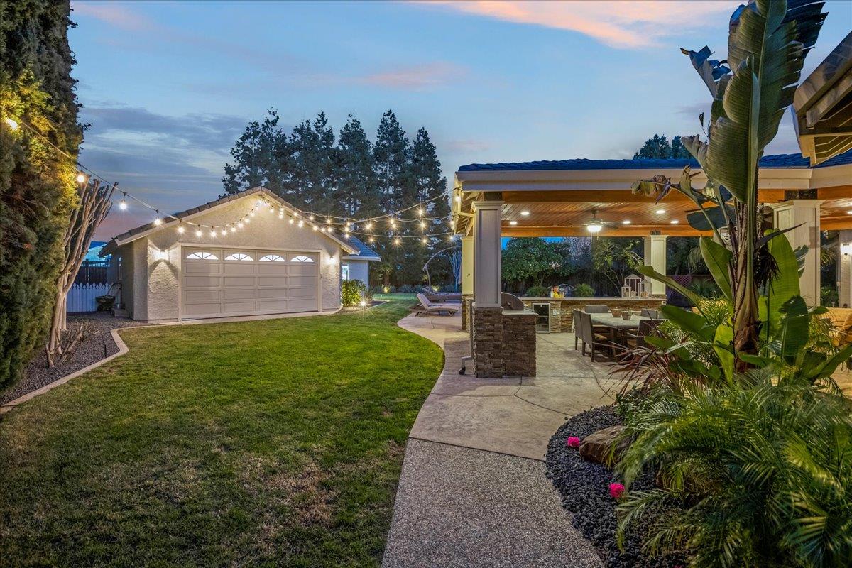 17446 Serene Drive Morgan Hill, CA 95037 - Photo 52 of 82 a view of a patio with table and chairs potted plants with large tree