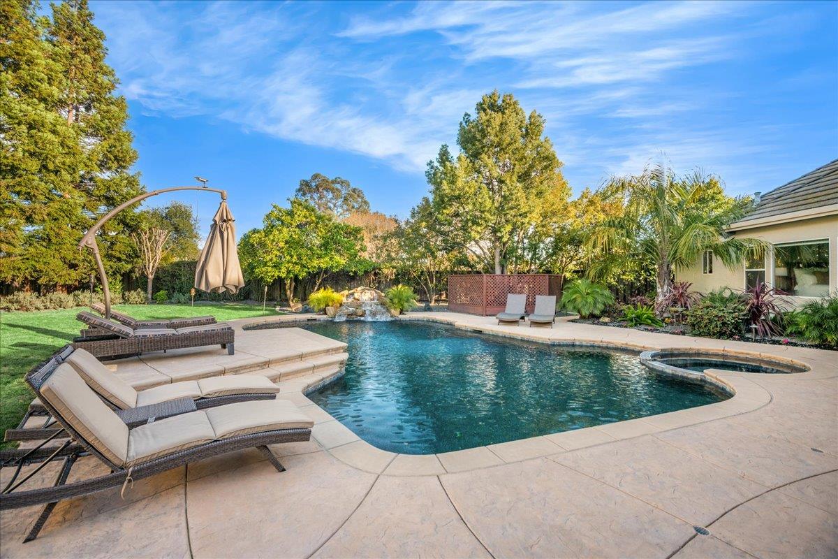 17446 Serene Drive Morgan Hill, CA 95037 - Photo 61 of 82 a view of a swimming pool with a patio