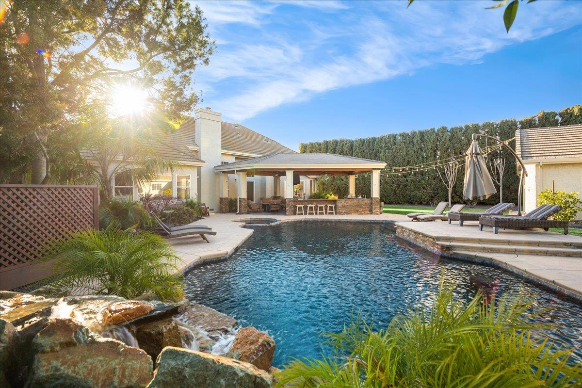 17446 Serene Drive Morgan Hill, CA 95037 - Photo 67 of 82 a view of a house with swimming pool and sitting area