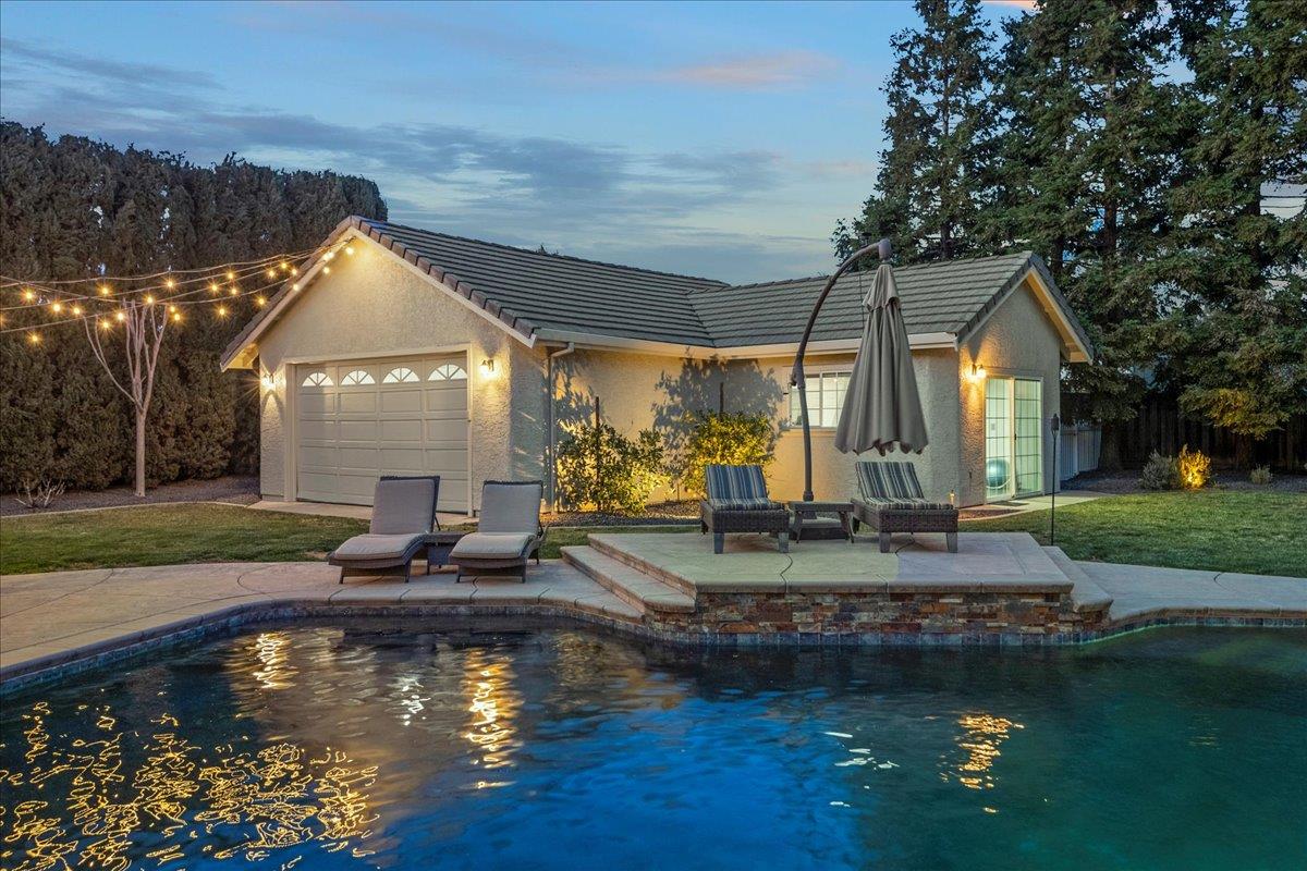 17446 Serene Drive Morgan Hill, CA 95037 - Photo 70 of 82 a view of a house with swimming pool and a yard