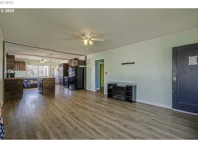a room with furniture and wooden floor