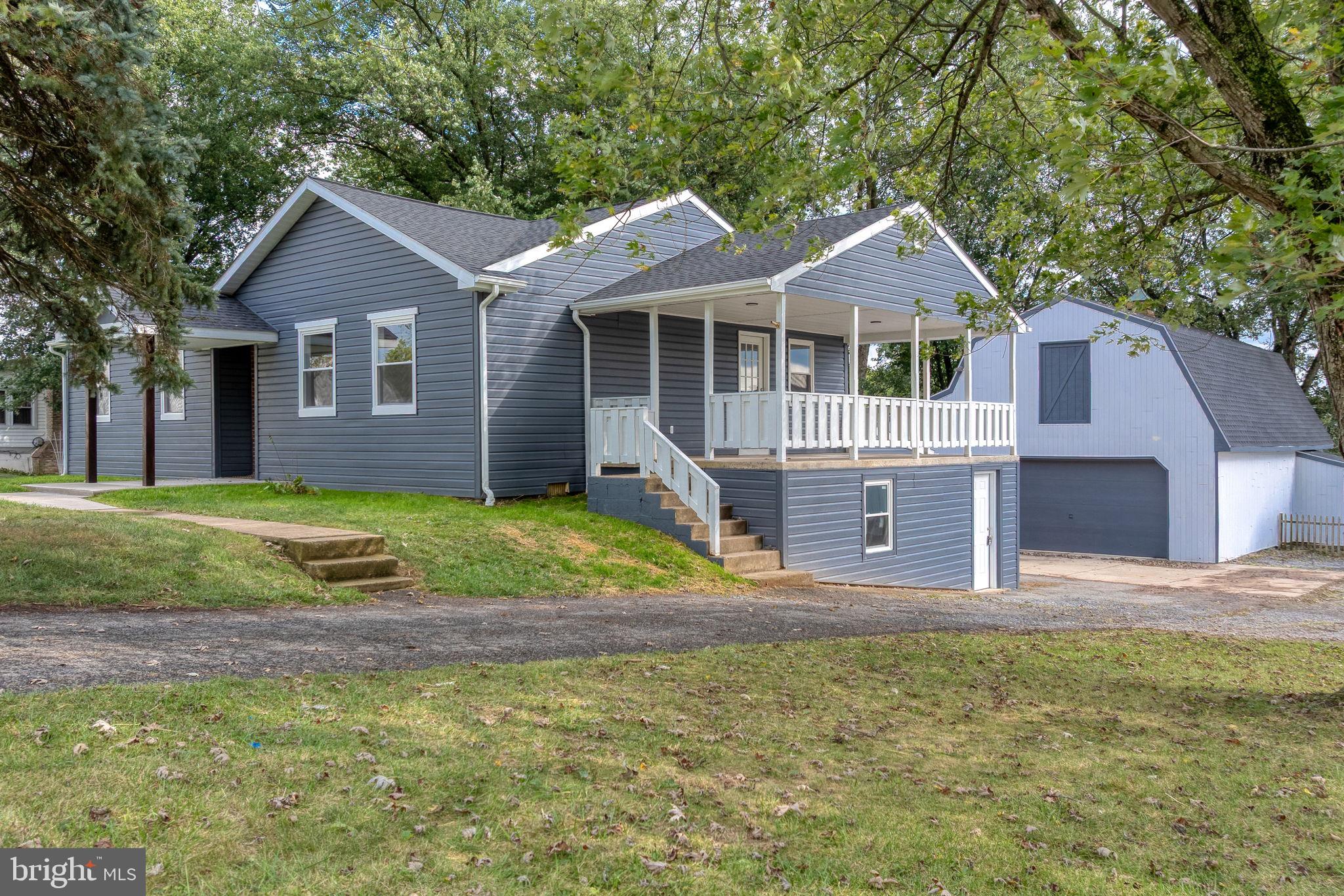front view of a house and a yard