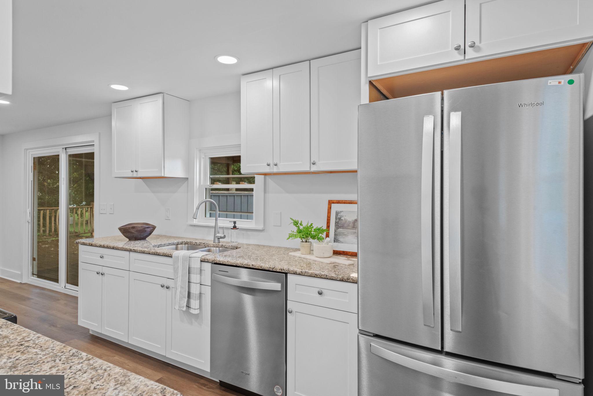 229 Cider Press Road Manheim, PA 17545 - Photo 14 of 47 a kitchen with stainless steel appliances granite countertop a refrigerator and a sink