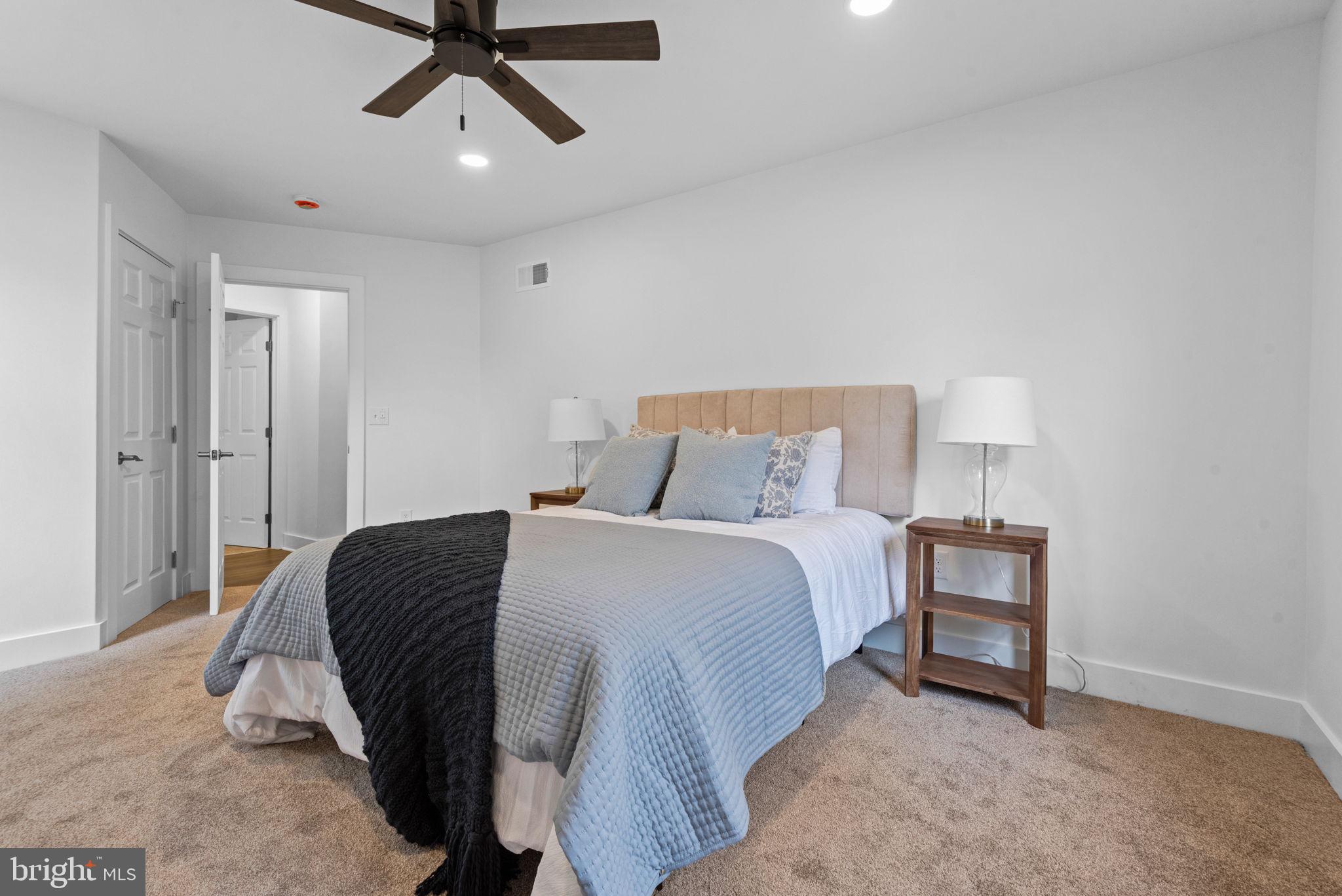 229 Cider Press Road Manheim, PA 17545 - Photo 17 of 47 a bedroom with a bed and a chandelier