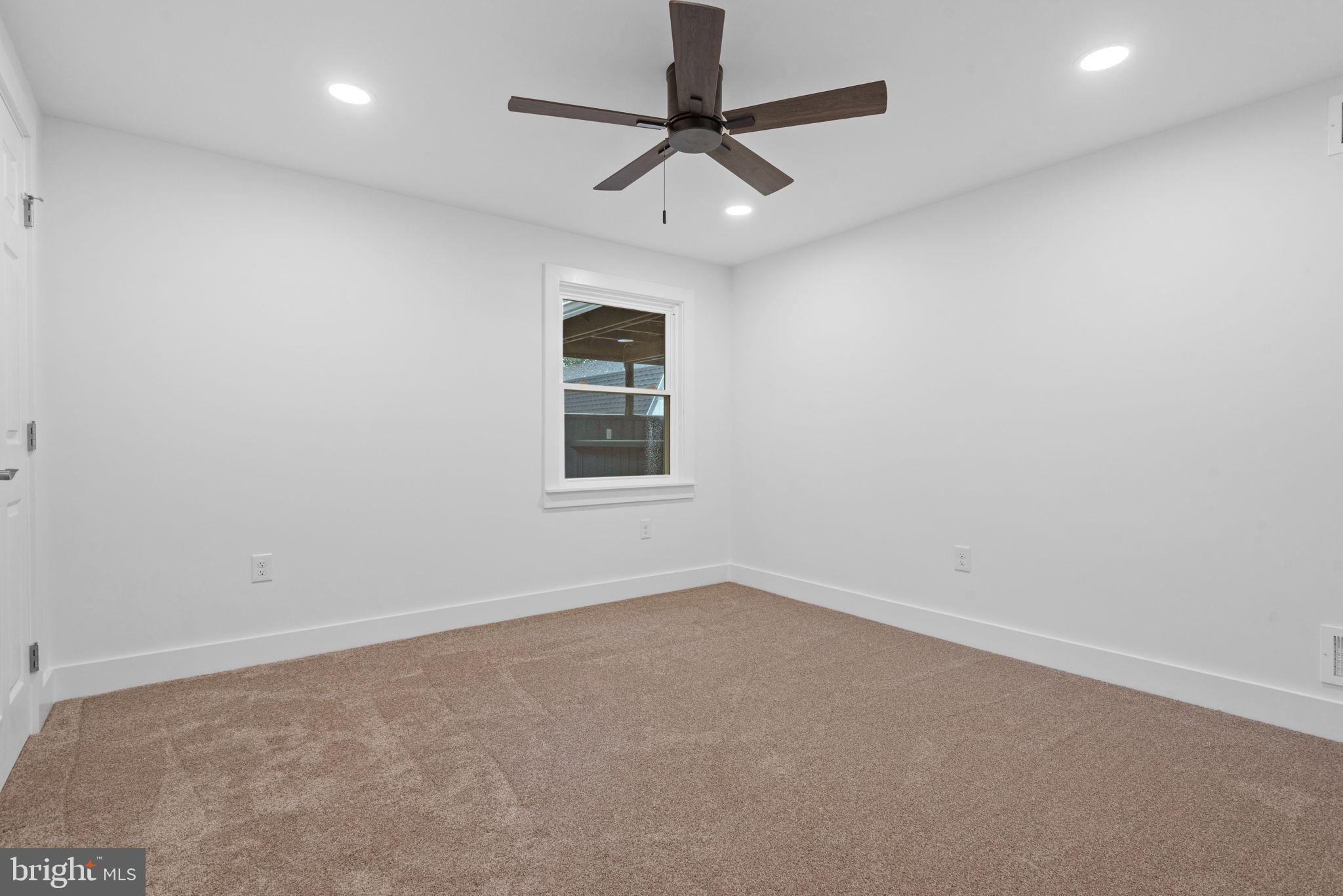 229 Cider Press Road Manheim, PA 17545 - Photo 26 of 47 an empty room with a window and a fan