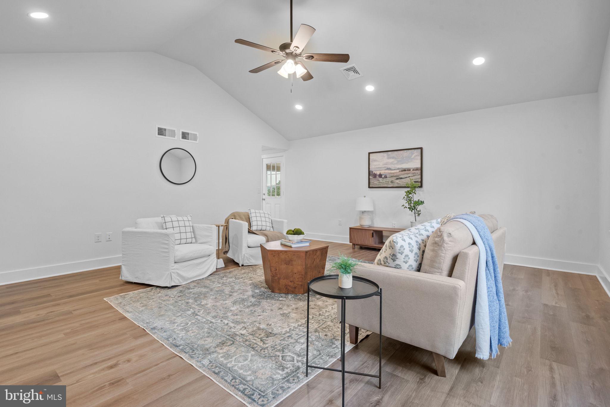 229 Cider Press Road Manheim, PA 17545 - Photo 4 of 47 a living room with furniture and a chandelier