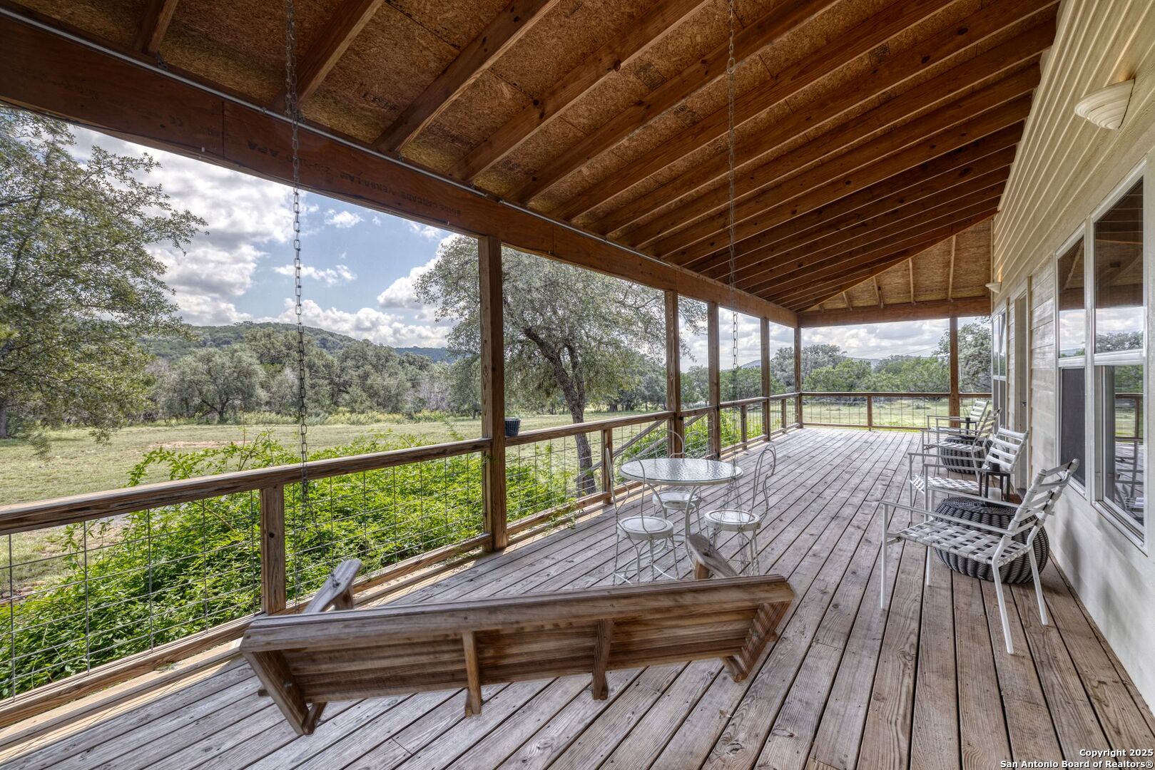 565 Loop Road Uvalde, TX 78801 - Photo 23 of 78 a view of balcony with wooden floor and outdoor space