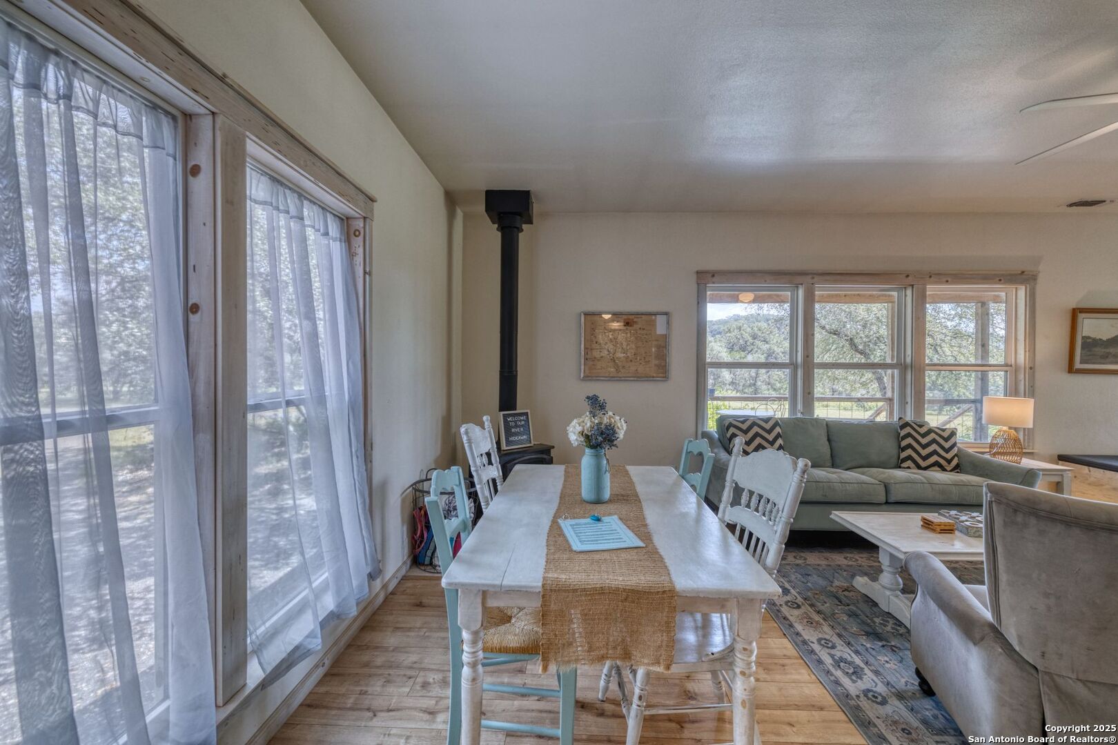 565 Loop Road Uvalde, TX 78801 - Photo 32 of 78 a living room with furniture and a large window