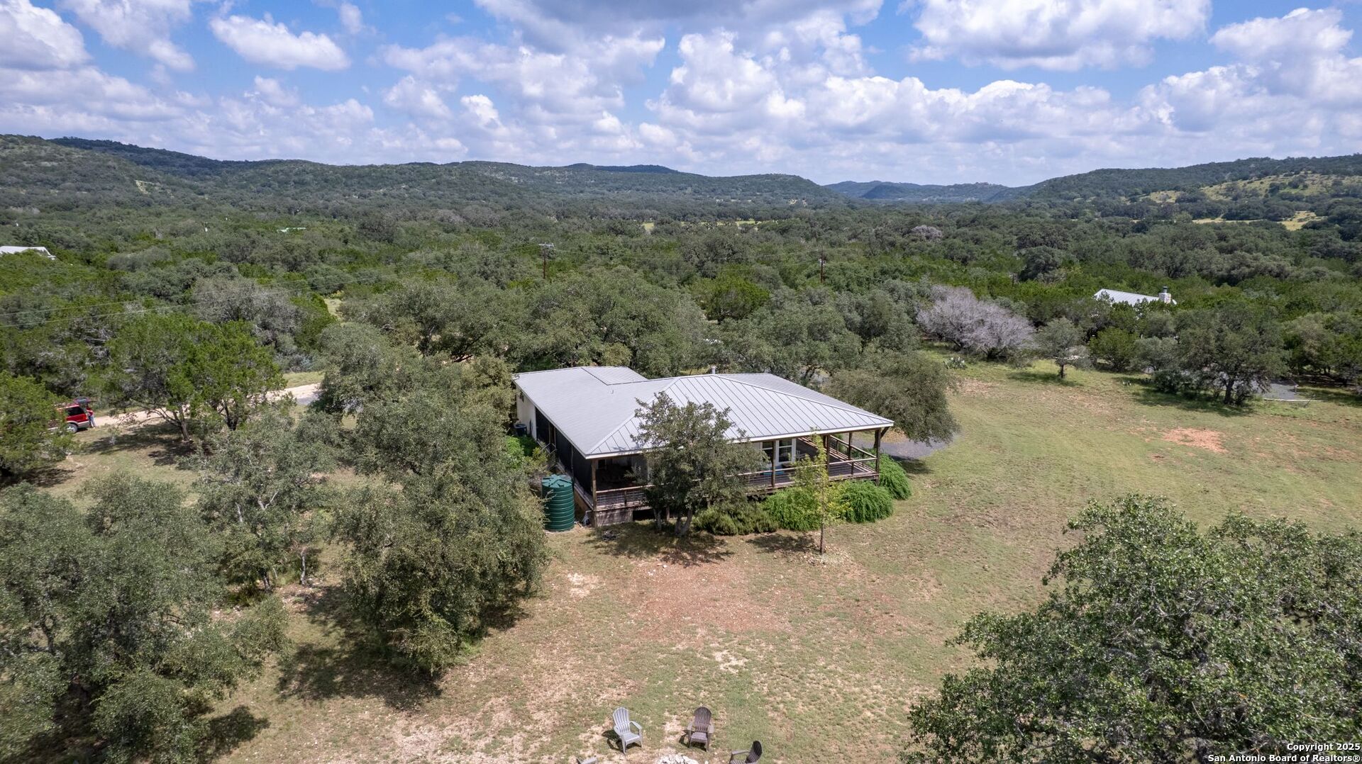 565 Loop Road Uvalde, TX 78801 - Photo 41 of 78 a view of a terrace with a table and chairs