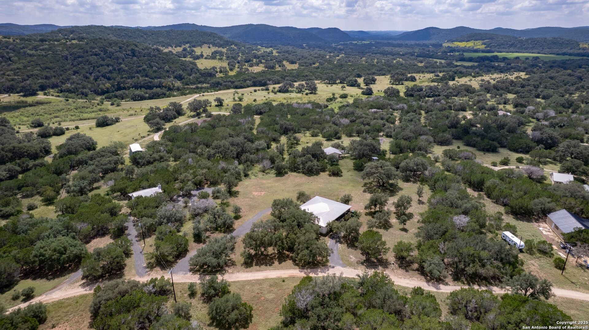 565 Loop Road Uvalde, TX 78801 - Photo 45 of 78 a view of a forest with mountains in the background