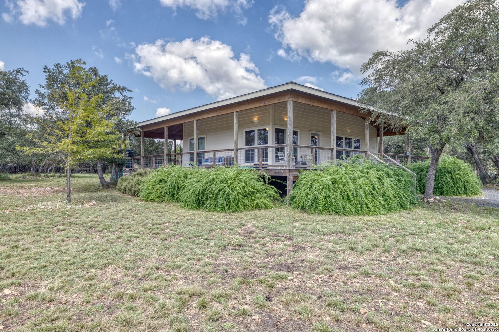 565 Loop Road Uvalde, TX 78801 - Photo 6 of 78 a front view of a house with garden