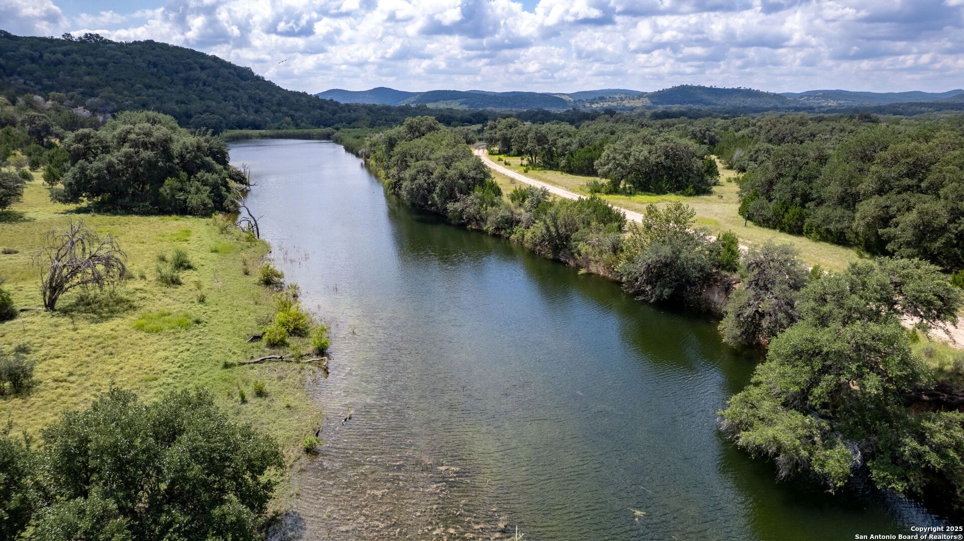 565 Loop Road Uvalde, TX 78801 - Photo 62 of 78 a view of lake with mountain