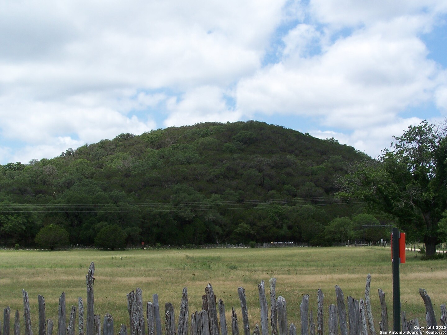 565 Loop Road Uvalde, TX 78801 - Photo 65 of 78 a view of a field with an trees in the background