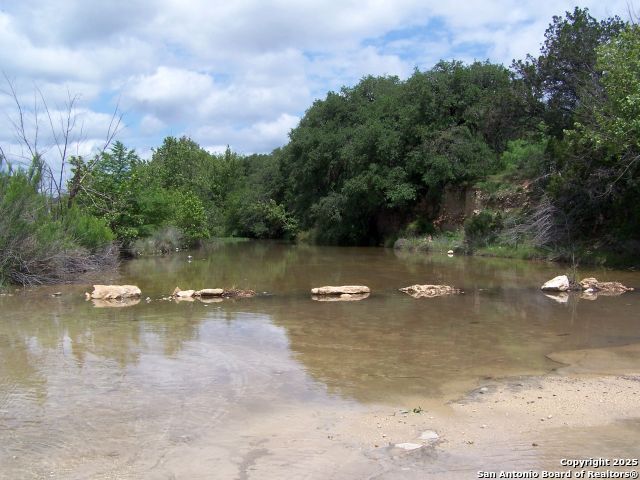 565 Loop Road Uvalde, TX 78801 - Photo 72 of 78 a view of a lake with houses