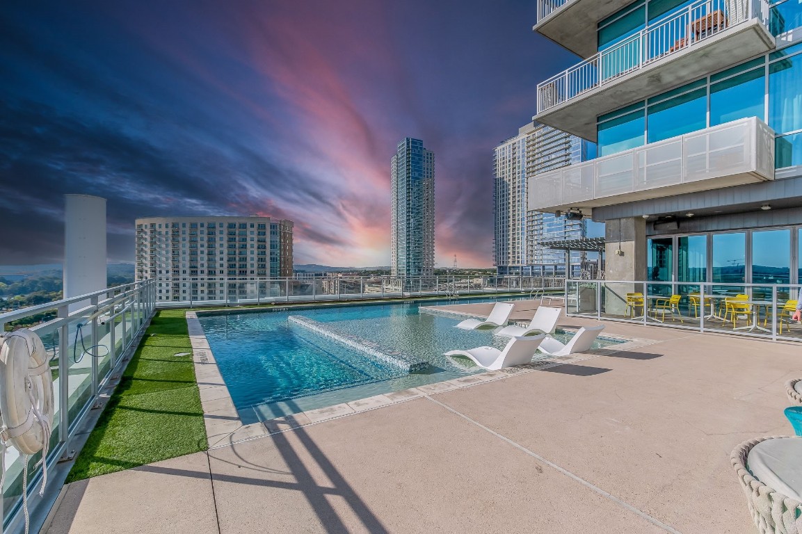 a view of pool with outdoor seating