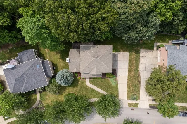 an aerial view of a house with a garden