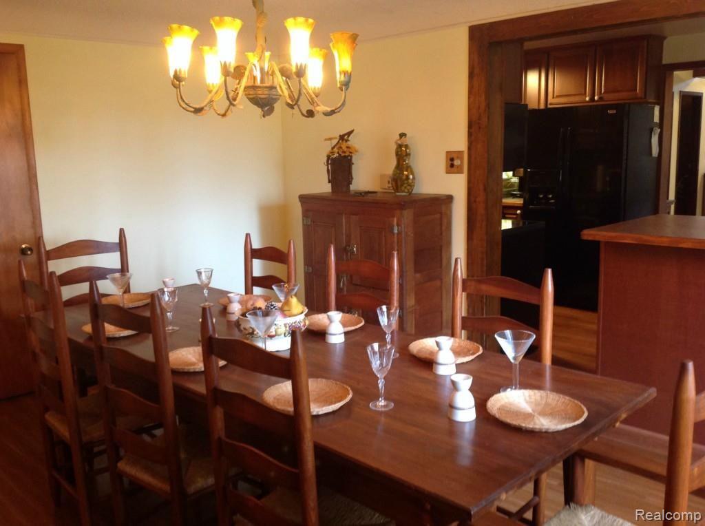 6147 Willis Road North Branch, MI 48461 - Photo 11 of 41 Formal Dining Room with Wood Floors