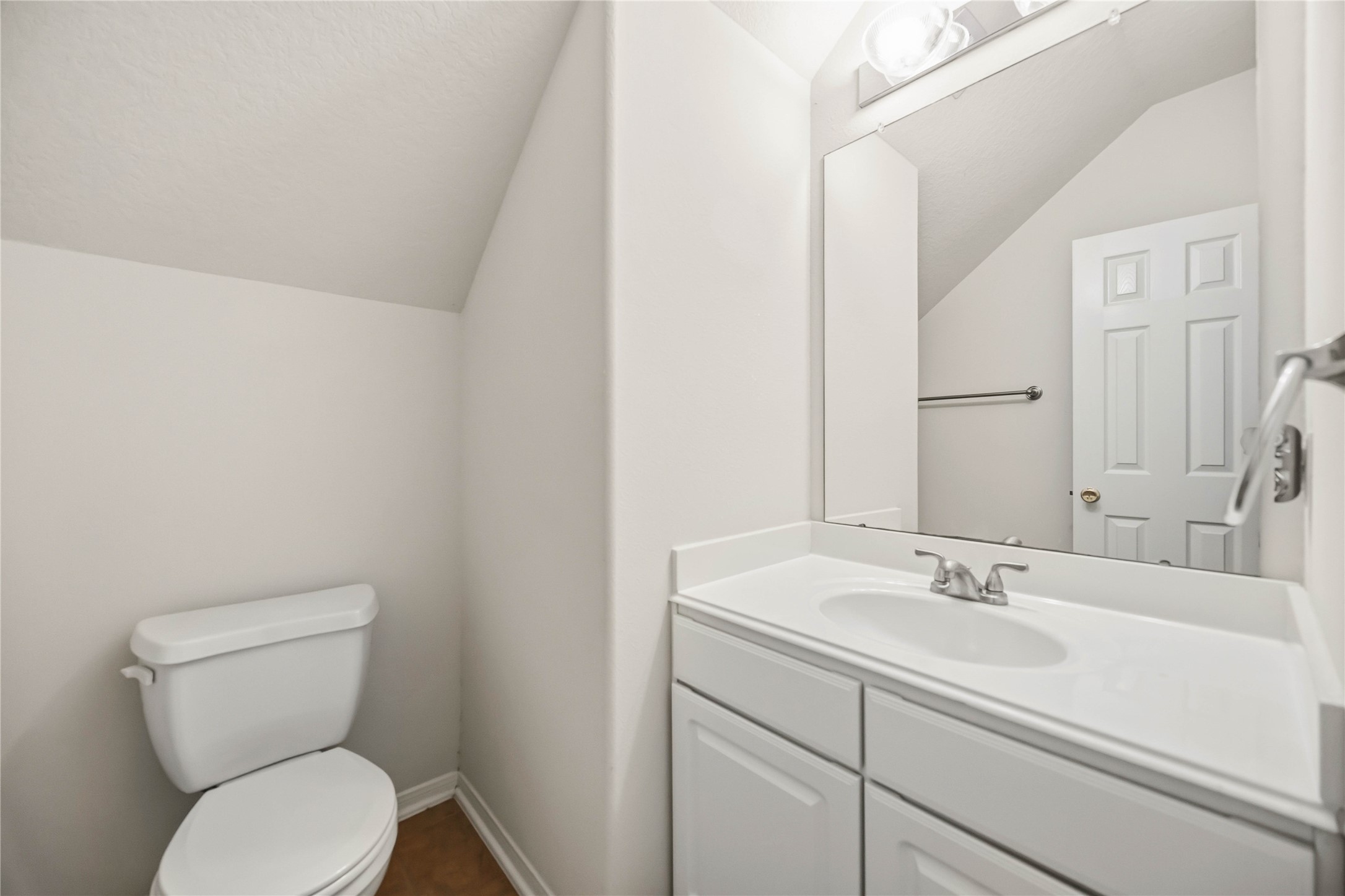 29526 Winton Wood Way Spring, TX 77386 - Photo 14 of 29 Convenient first-floor half bath, perfect for guests.