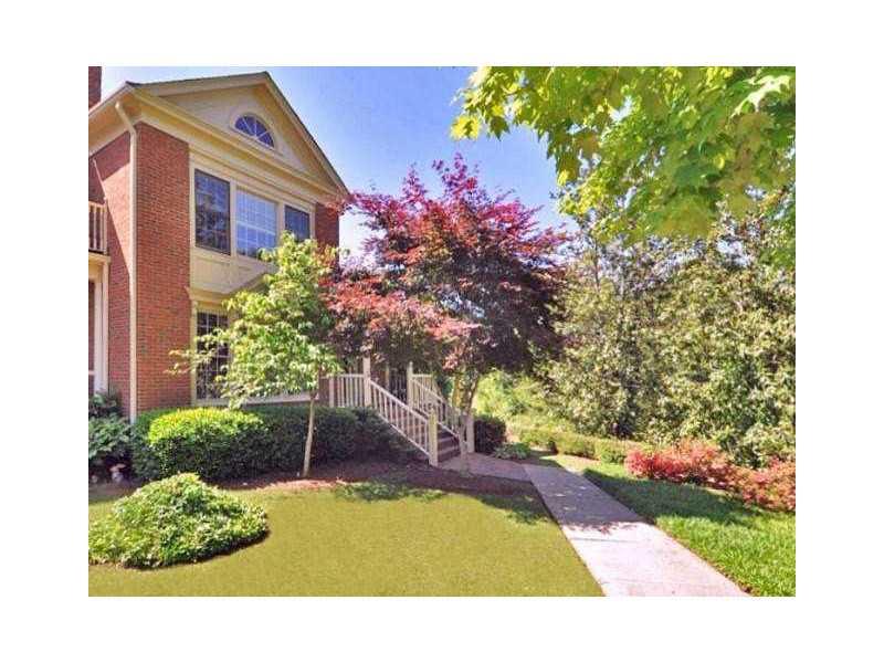 Exterior Front. Wonderful End Unit with Water Views and Large Walk-out Grassy Area for Spot The Dog.