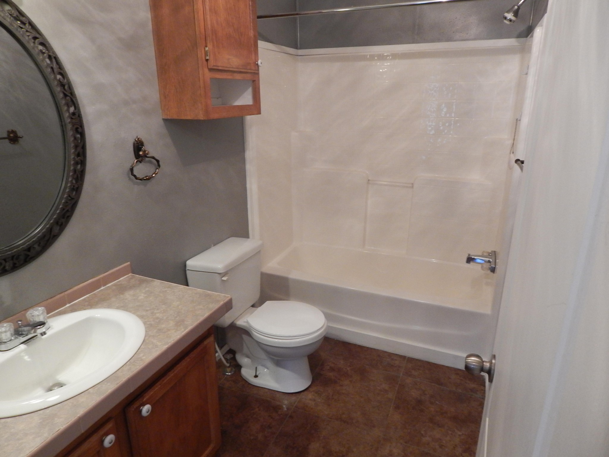 193 Crisman Road Heiskell, TN 37754 - Photo 14 of 31 a bathroom with a granite countertop sink toilet and a mirror