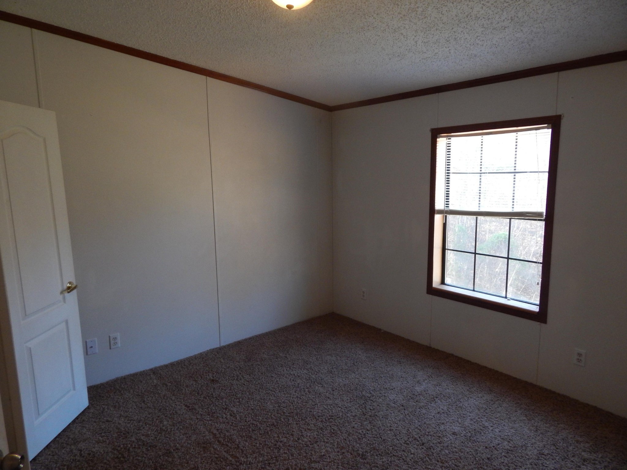 193 Crisman Road Heiskell, TN 37754 - Photo 16 of 31 an empty room with a window