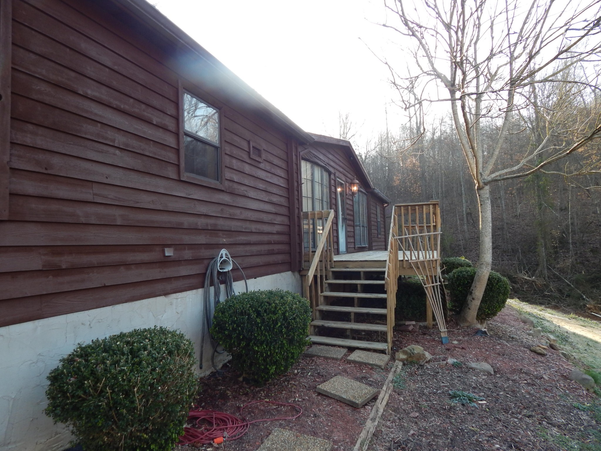 193 Crisman Road Heiskell, TN 37754 - Photo 2 of 31 a backyard of a house with lots of green space