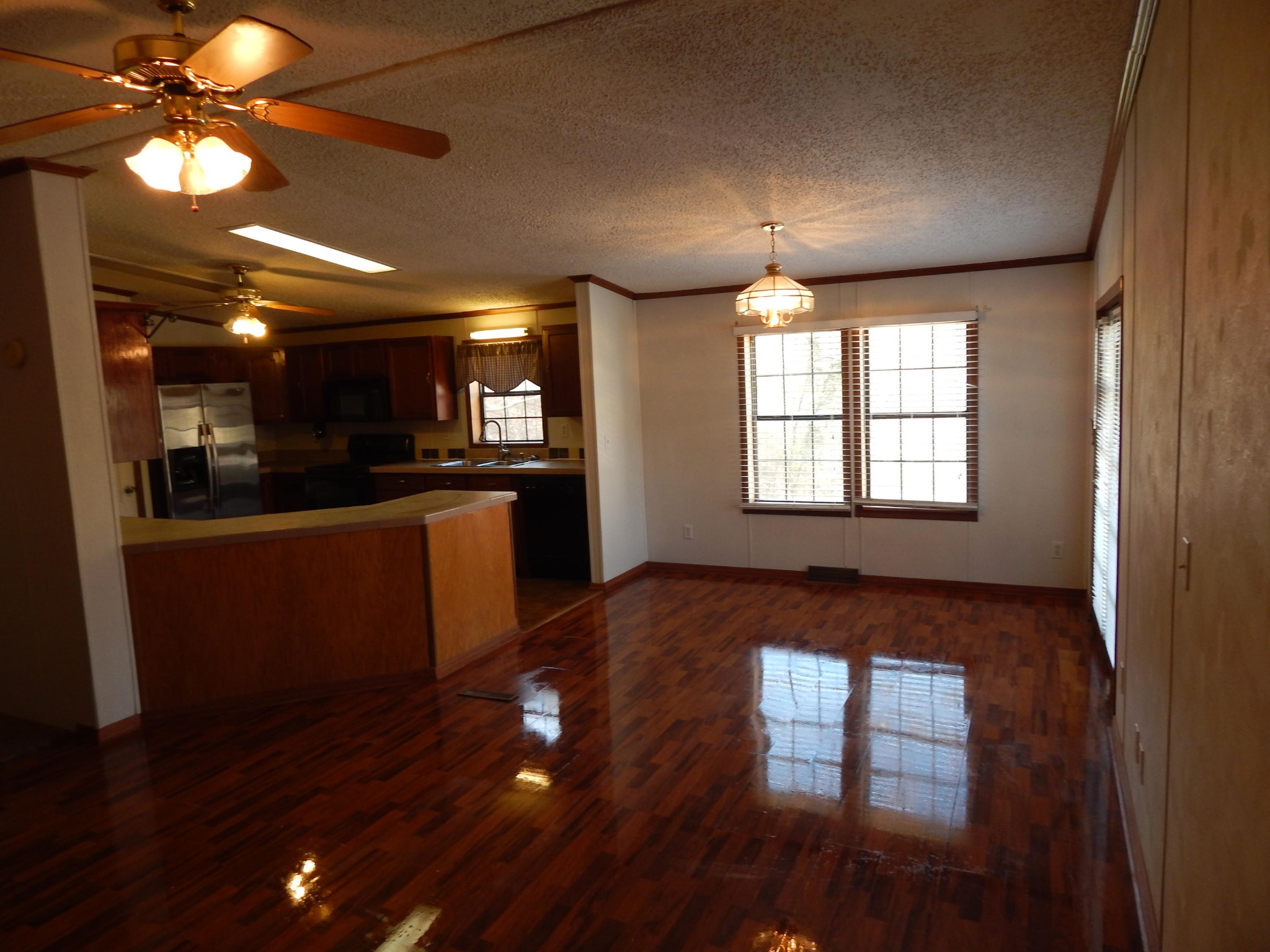 193 Crisman Road Heiskell, TN 37754 - Photo 23 of 31 a view of kitchen with cabinets and wooden floor
