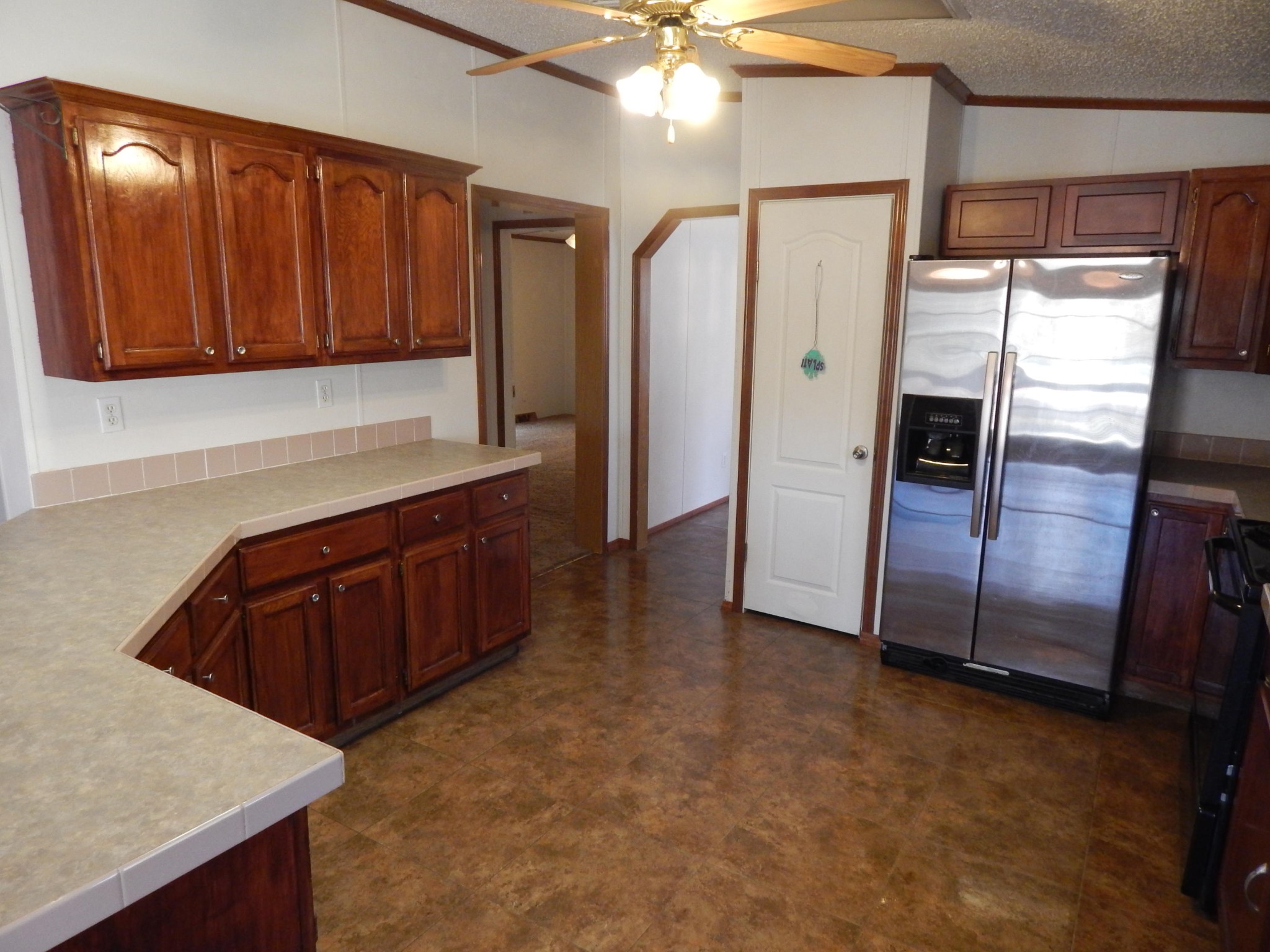 193 Crisman Road Heiskell, TN 37754 - Photo 25 of 31 a kitchen with stainless steel appliances granite countertop a refrigerator and a sink