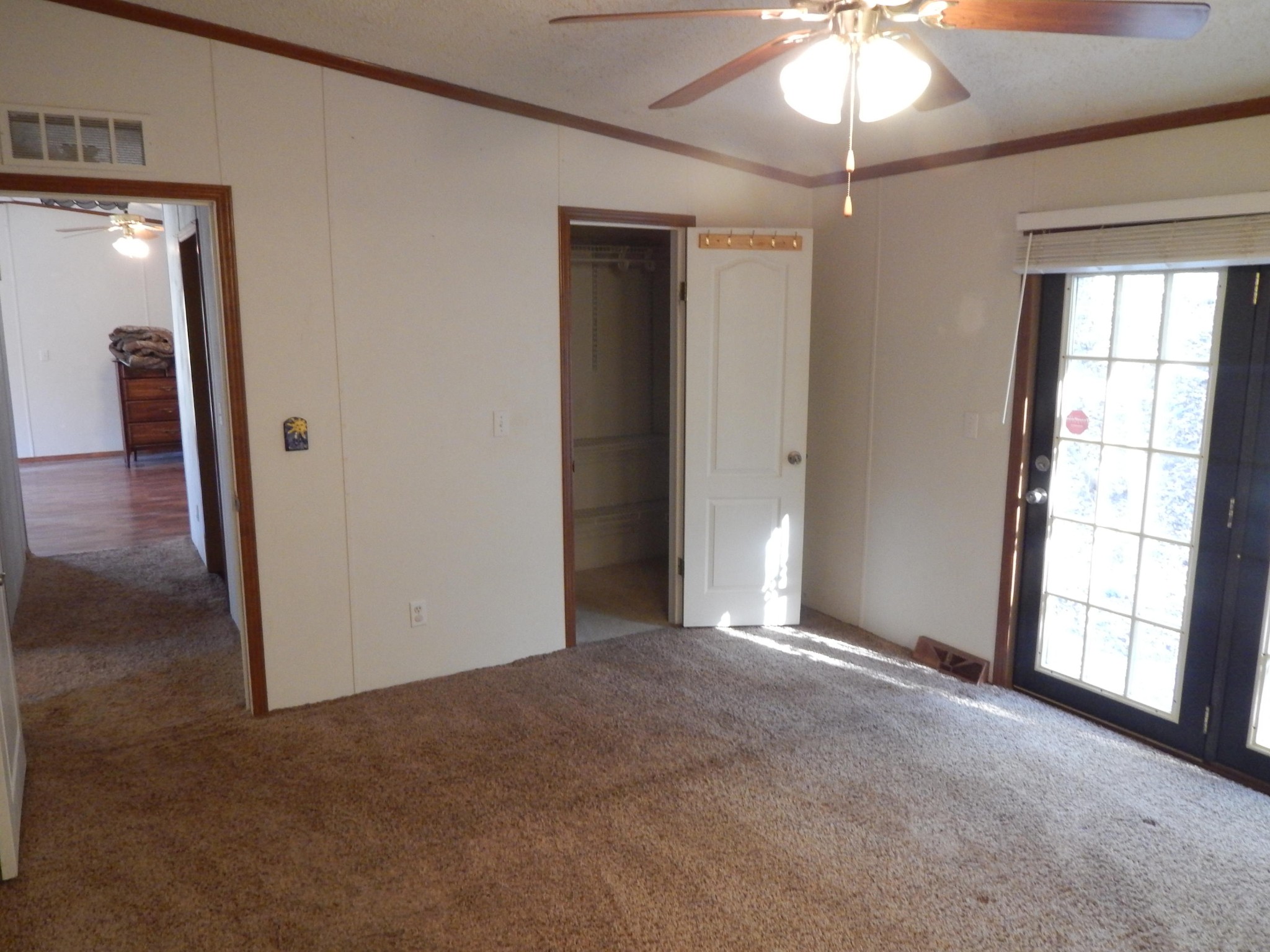 193 Crisman Road Heiskell, TN 37754 - Photo 10 of 31 a view of empty room with window and chandelier fan