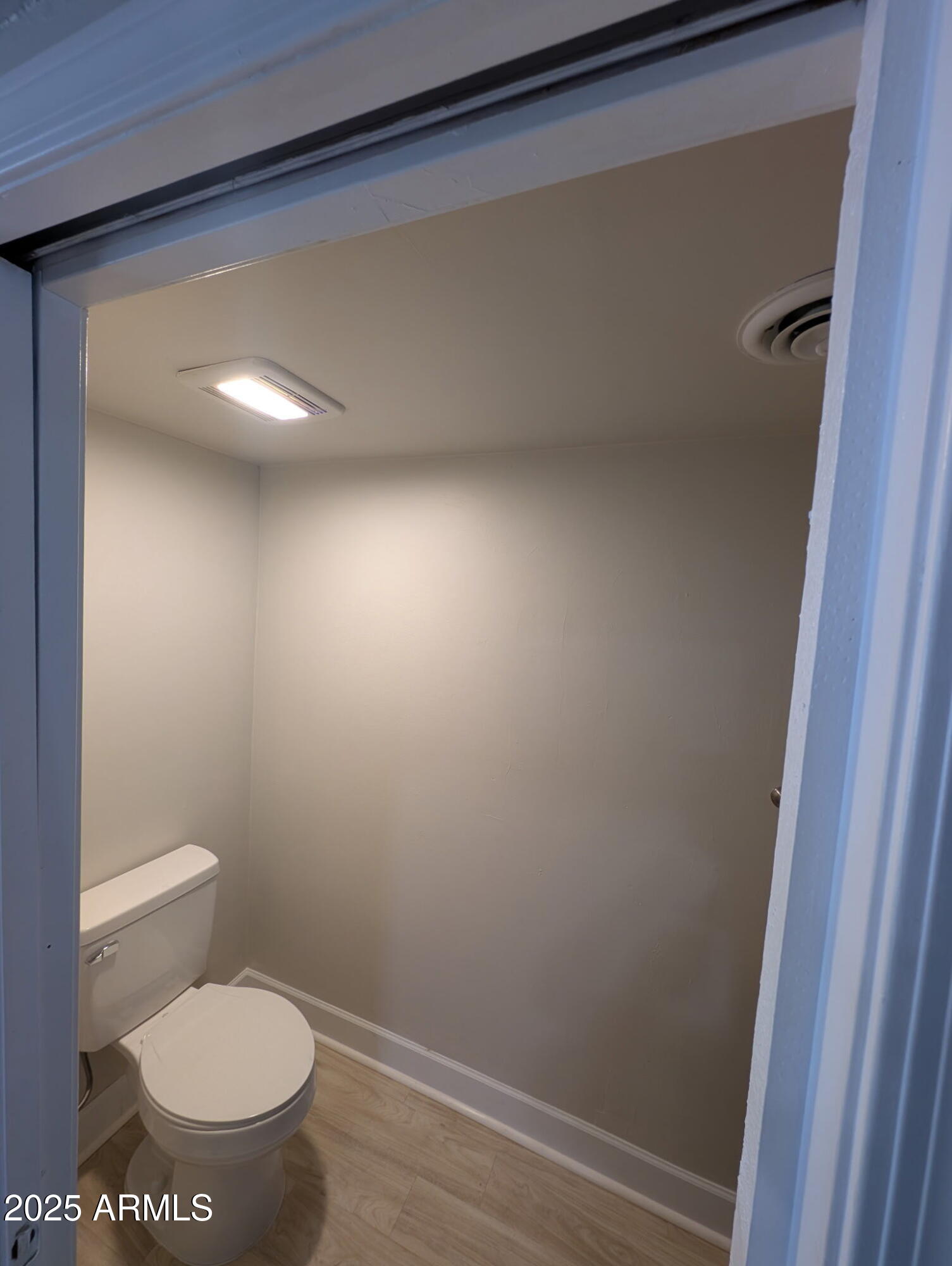 7126 North 19th Avenue, Unit 140 Phoenix, AZ 85021 - Photo 4 of 17 a bathroom with a toilet and a vanity