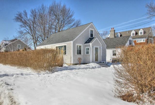 576 Rowland Road Fairfield, CT 06824 - Photo 1 of 1 a view of a large white house with a large tree in front of it