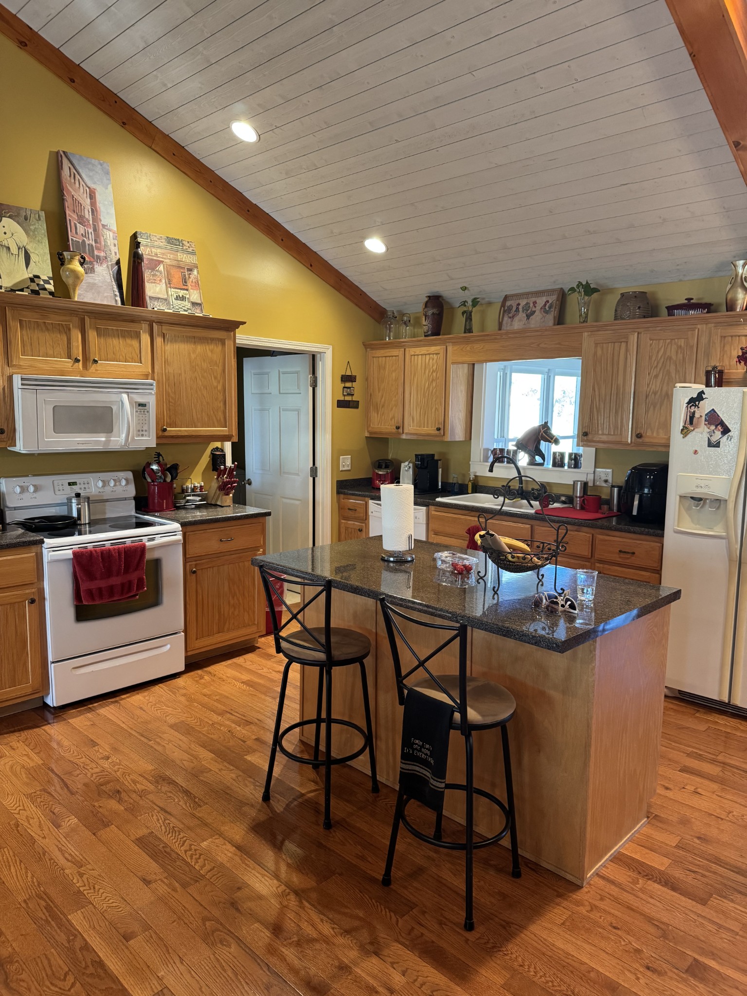 11144 Franklin Road Franklin, KY 42134 - Photo 33 of 47 a kitchen with stainless steel appliances kitchen island granite countertop a table chairs sink and cabinets