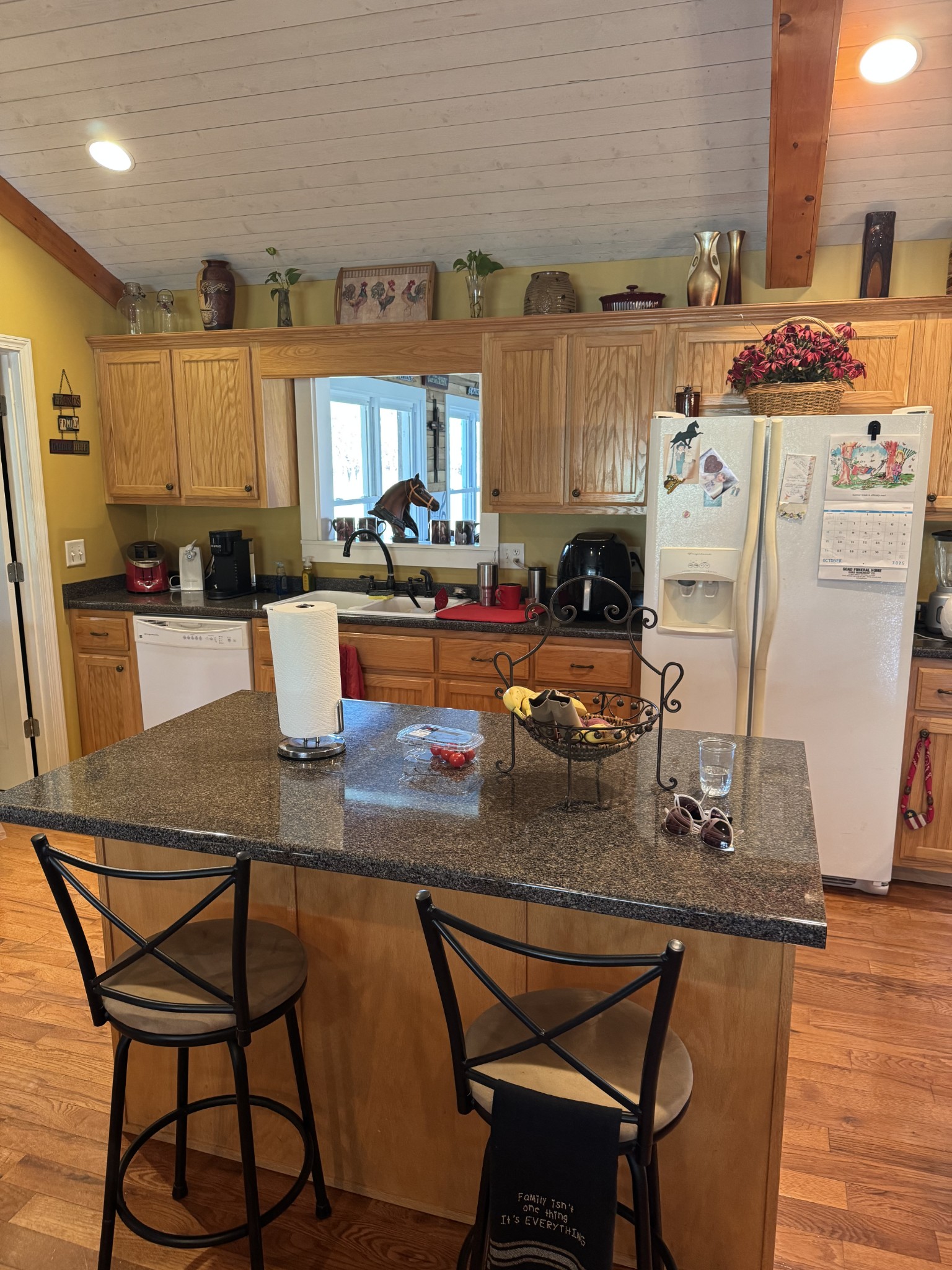 11144 Franklin Road Franklin, KY 42134 - Photo 35 of 47 a kitchen with stainless steel appliances granite countertop a table chairs in it and a wooden floor