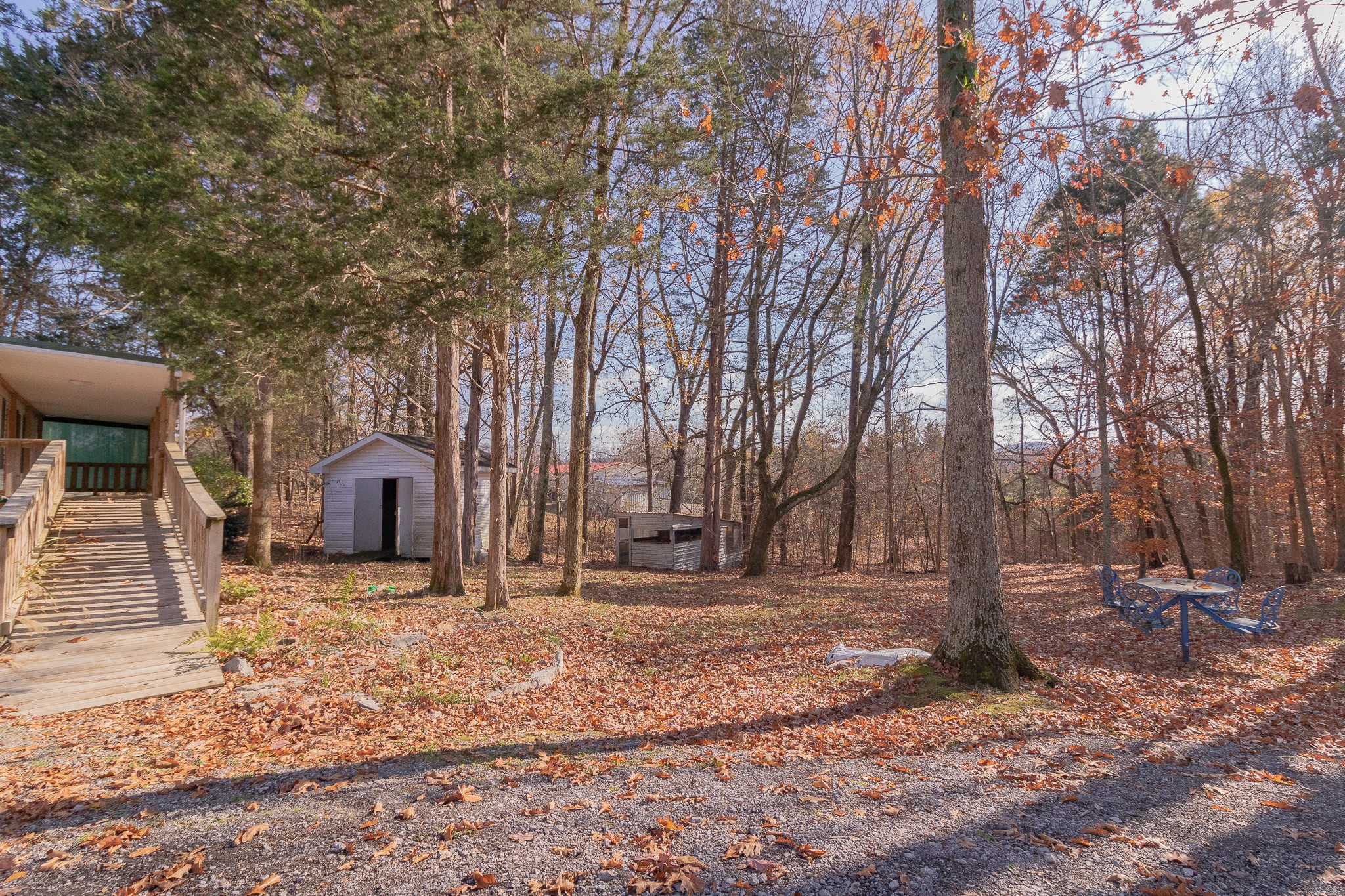833 Speck Road Lebanon, TN 37087 - Photo 2 of 40 a view of a house with a yard covered in snow