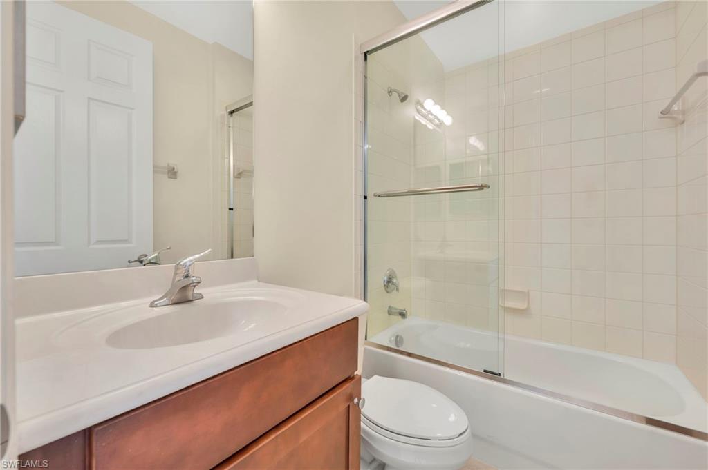 6505 Monterey Point, Unit 202 Naples, FL 34105 - Photo 12 of 30 Full bath outside of the 2 guest bedrooms.