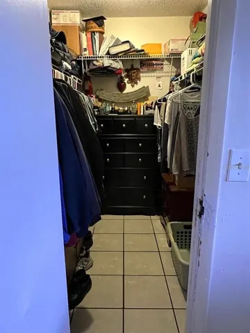 a bathroom with a toilet sink and shower